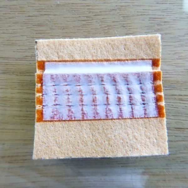 Optionen für die Verhinderung von Filterbeutelleckagen in Kohlekraftwerken: Vergleich des Klebstoffbeschichtungsprozesses und PTFE-Klebeband-Bewerbungsprozess